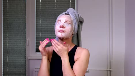 Women-finish-applying-facial-mask