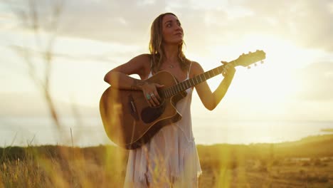 Young-Woman-Playing-Guitar