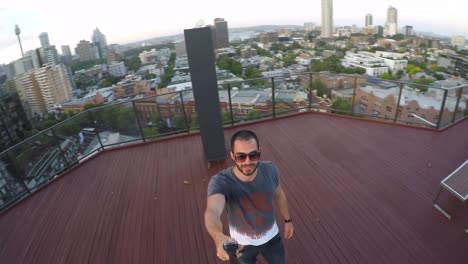 Man-taking-a-selfie-in-Sydney,-Australia