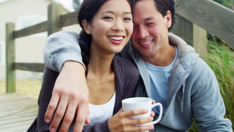 Healthy-Ethnic-Male-Female-Keeping-Warm-Outdoors-Beach