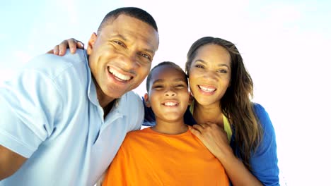 Portrait-of-African-American-family-on-beach-holiday