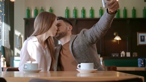 Happy-Couple-Taking-Selfie-on-Date