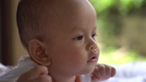 Happy-portrait-baby-boy-playing-alone