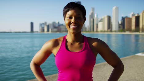 Portrait-of-African-American-female-stretching-after-workout