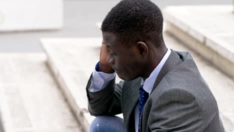 Pensive-sad-lonely-American-african-business-man.-job-problems