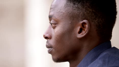 pensive-young-black-african-man--profile