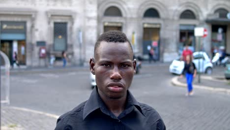 Serious-Black-american-guy-staring-at-camera-in-the-street