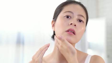 girl-applying-cosmetic-cream