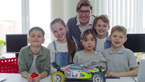 Schoolchildren-and-Teacher-During-Engineering-Lesson