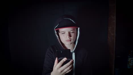 4k-Portrait-of-Boy-Child-Posing-with-Mobile-Phone