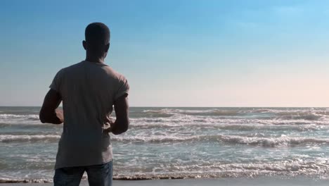 Run,nature,health.-young-black-man-running-on-the-beach--back-view