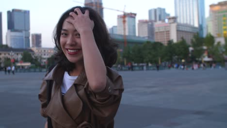 Portrait-of-one-pretty-young-asian-woman-in-the-city