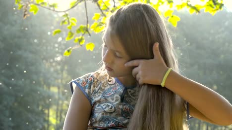 Pretty-girl-combing-her-hair