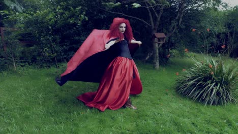 4k-Halloween-Shot-of-Red-Riding-Hood-Standing-in-the-Wind