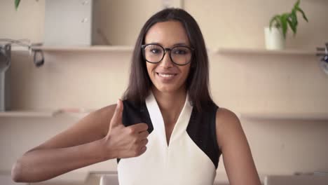 Young-lady-hands-gesture-thumbs-up