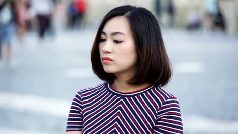 sad-and-worried-chinese-woman's-portrait:-sad-chinese-lady,-pensive,-worried