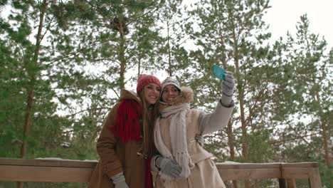 Taking-Selfie-with-Bestie-in-Winter-Forest