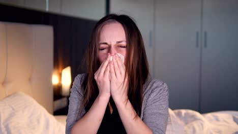 The-portrait-of-the-sneezing-woman.-Close-up.-4K.