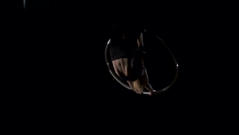 Flexible-gymanst-performs-a-trick-in-the-aerial-hoop
