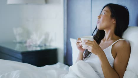 Woman-Waking-up-Drinking-Coffee