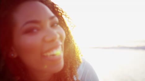 Portrait-of-voluptuous-Ethnic-female-smiling-to-camera