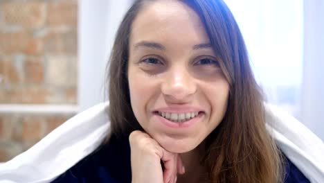 Close-Up-of-Smiling-Hispanic-Woman-Face-Lying-in-Bed