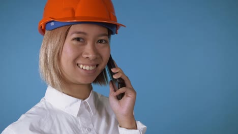 beautiful-worker-in-uniform-talking-by-mobile