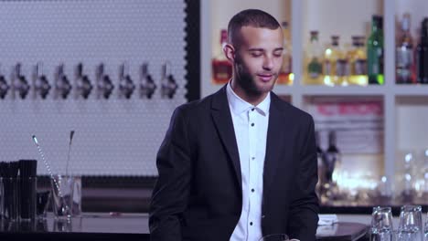 Portrait-shot-of-a-young-attractive-African-American-man-at-a-bar