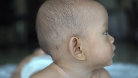 Happy-portrait-baby-boy-playing-alone