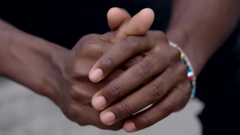 focus-on-Problems,worries,thoughts.-Young-black-man-alone-rubbing-his-hands-thinking