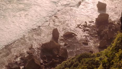 Warm-colors-of-sunset-or-sunrise-with-ocean-and-rocks