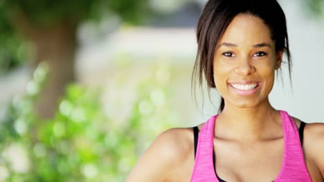 Portrait-young-African-American-woman-doing-fitness-routine