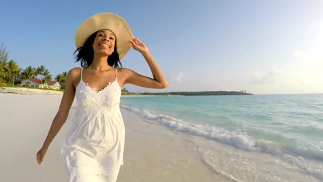 African-American-female-enjoying-freedom-on-tropical-beach