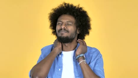 Afro-American-Man-with-Neck-Pain,-Yellow-Background