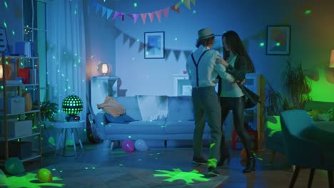 Romantic-Couple-at-Home:-Beautiful-Young-People,-Boy-and-Girl-Dancing-Slowly-in-the-Living-Room.-Stylish-Young-People-in-Love-Waltz.-Closeu-up-Slow-Motion-Shot.-Disco-Ball-Lighting.