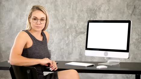 Smart-professional-woman-near-computer.-White-Display