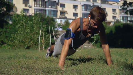 Young-boy-athlete-squeezed-in-a-park-near-the-house