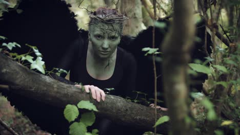 4k-Halloween-Dark-Angel-Woman-with-Black-Wings-in-Forest-Approaching-Camera