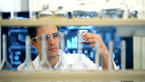 Laboratory-scientist-working-at-lab-with-test-tubes