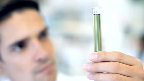 Laboratory-scientist-working-at-lab-with-test-tubes