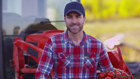 Portrait-of-farmer-sitting-on-tractor