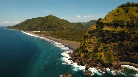 Tropical-landscape,-sea,-beach,-mountains