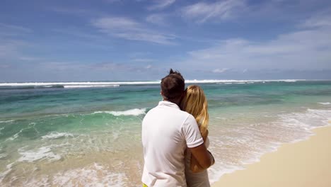 Familie-paar-am-Strand