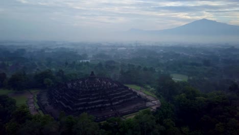 Aerial-view-drone-shot-of-Borobudur-temple-in-Java-at-sunrise,-Indonesia-Travel-religion-drone-concept-4K-resolution