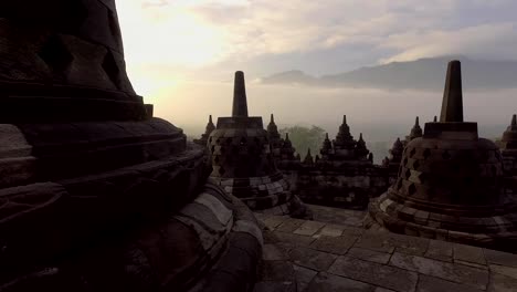 Borobudur-temple-at-sunrise,-Central-Java,-Indonesia.-4K-resolution-video-Travel-religion-exploration-concept