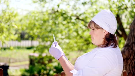 A-female-vet-takes-a-syringe-vaccine