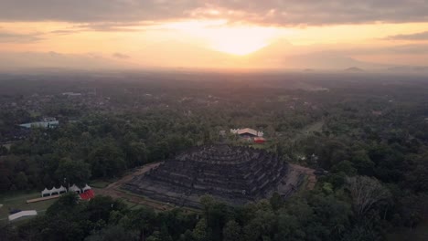 Borobudur-temple-aerial-view-at-sunrise-a-UNESCO-site-and-World-largest-Buddhist-temple,-Indonesia