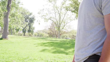 Slow-Motion-Shot-Of-Father-Hugging-Daughter-In-Park