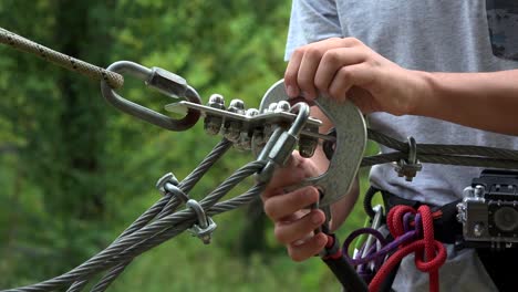 Safety-equipment-carabiner-and-ropes-for-climbing-trees-in-extreme-park