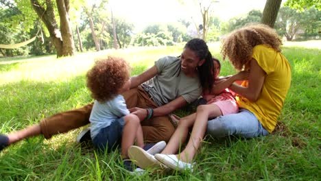 Cute-brother-and-sister-spends-time-with-their-parents.